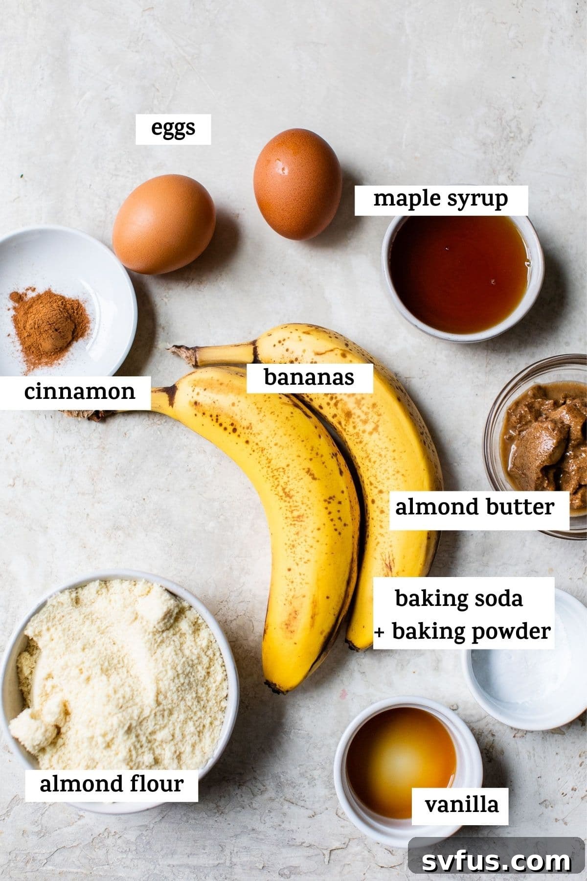 All the ingredients for almond flour banana muffins laid out with descriptive text overlay.