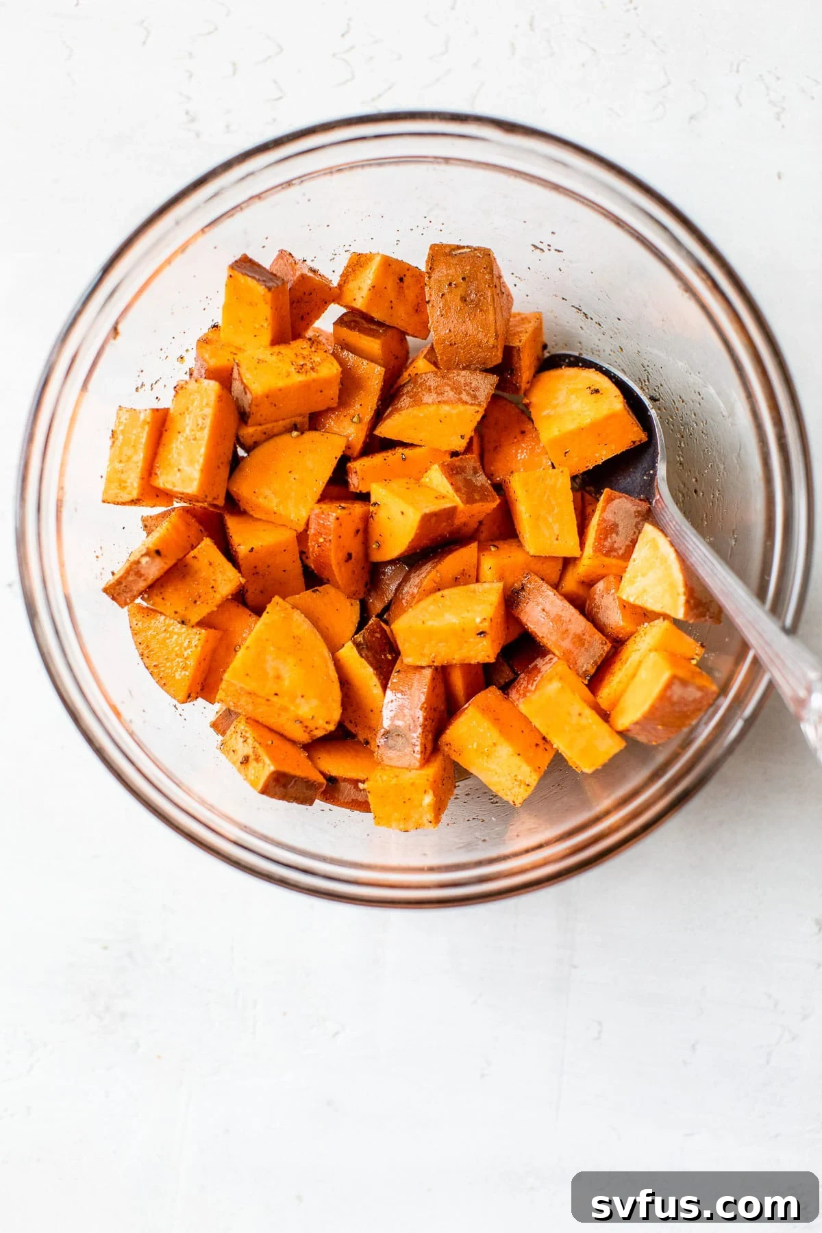 diced sweet potatoes in a glass bowl