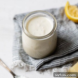 salad dressing in a small glass jar