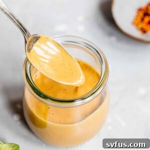 orange dipping sauce in a jar