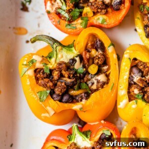 stuffed bell peppers in a casserole dish