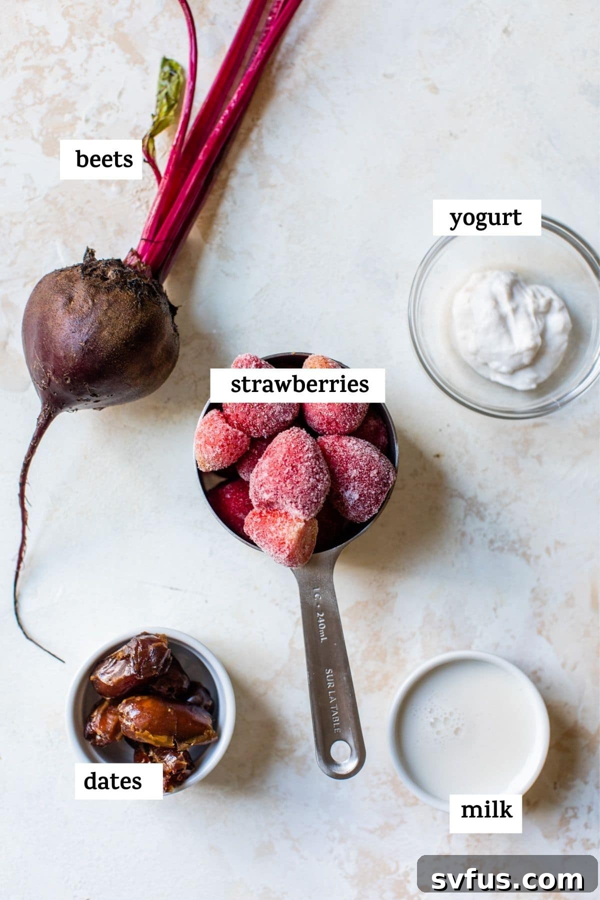 Fresh fruits, including strawberries and a beet, arranged artfully with text overlay.