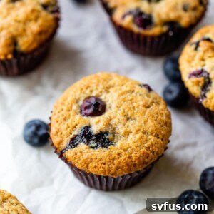 blueberry muffins on parchment paper