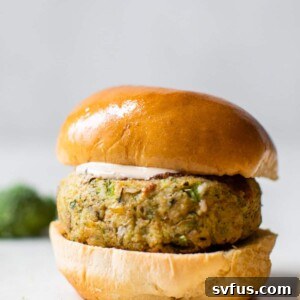 Delicious cheesy broccoli potato veggie burger on a toasted bun