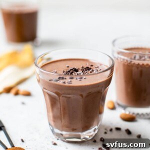three glasses filled with a brown drink