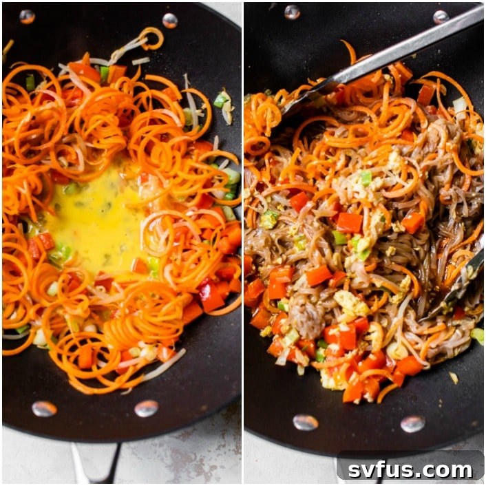 Carrot noodles in a skillet with scrambled egg