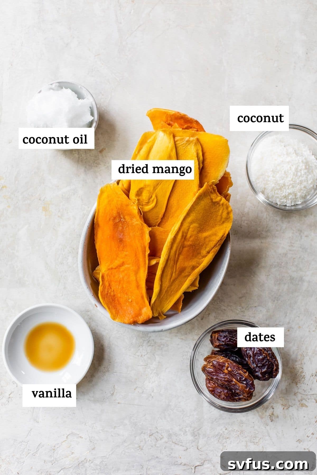 Essential ingredients for making delicious Mango Energy Balls, including vibrant dried mango and shredded coconut.