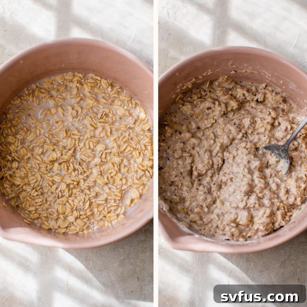 A vibrant pink bowl filled with creamy, softened oatmeal, ready for the next stages of pancake batter preparation.