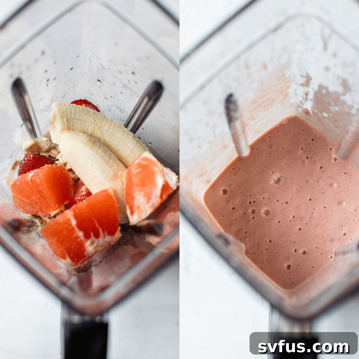 Smoothie ingredients, including grapefruit, strawberries, oats, cashews, and mint, inside a blender cup.