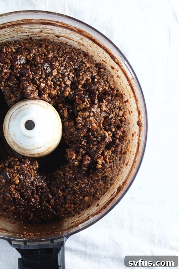 Raw Vegan Nutella Brownies, showcasing their rich texture.