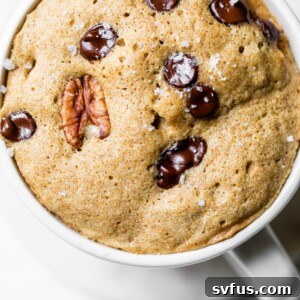 mug cake with chocolate chips and pecans
