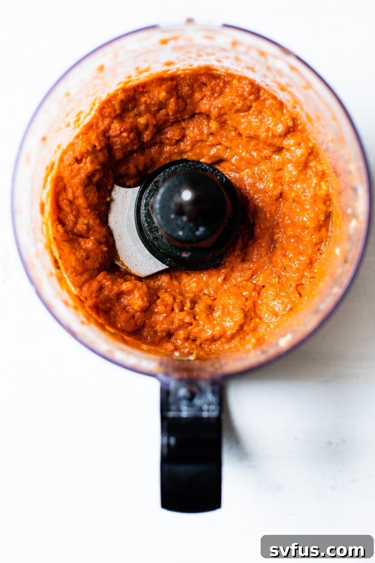 blended pesto in a food processor