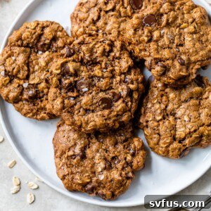 a plate of almond butter oatmeal cookies with chocolate chips