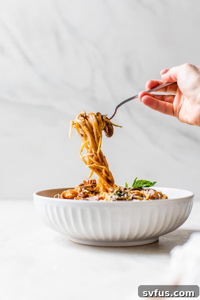 pasta being twirled on a fork