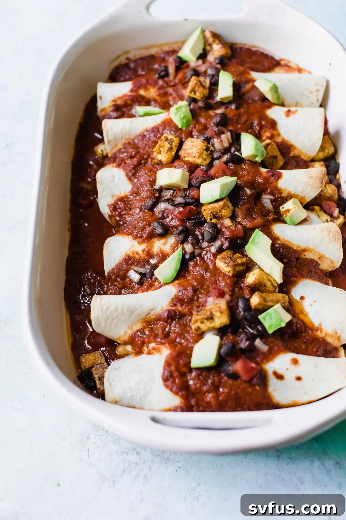 casserole dish filled with enchiladas