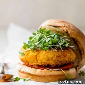 chickpea burger on a bun with microgreens