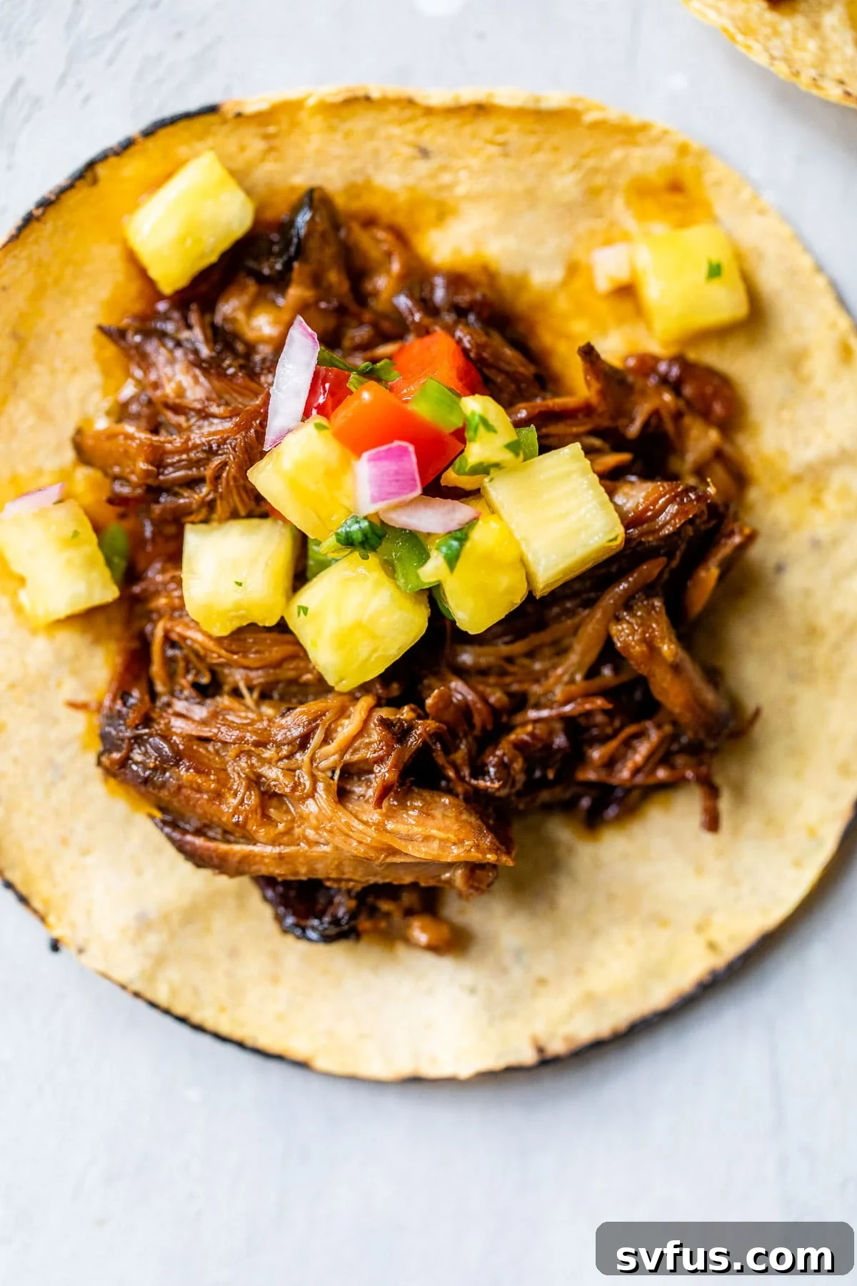 close up photo of a pork taco