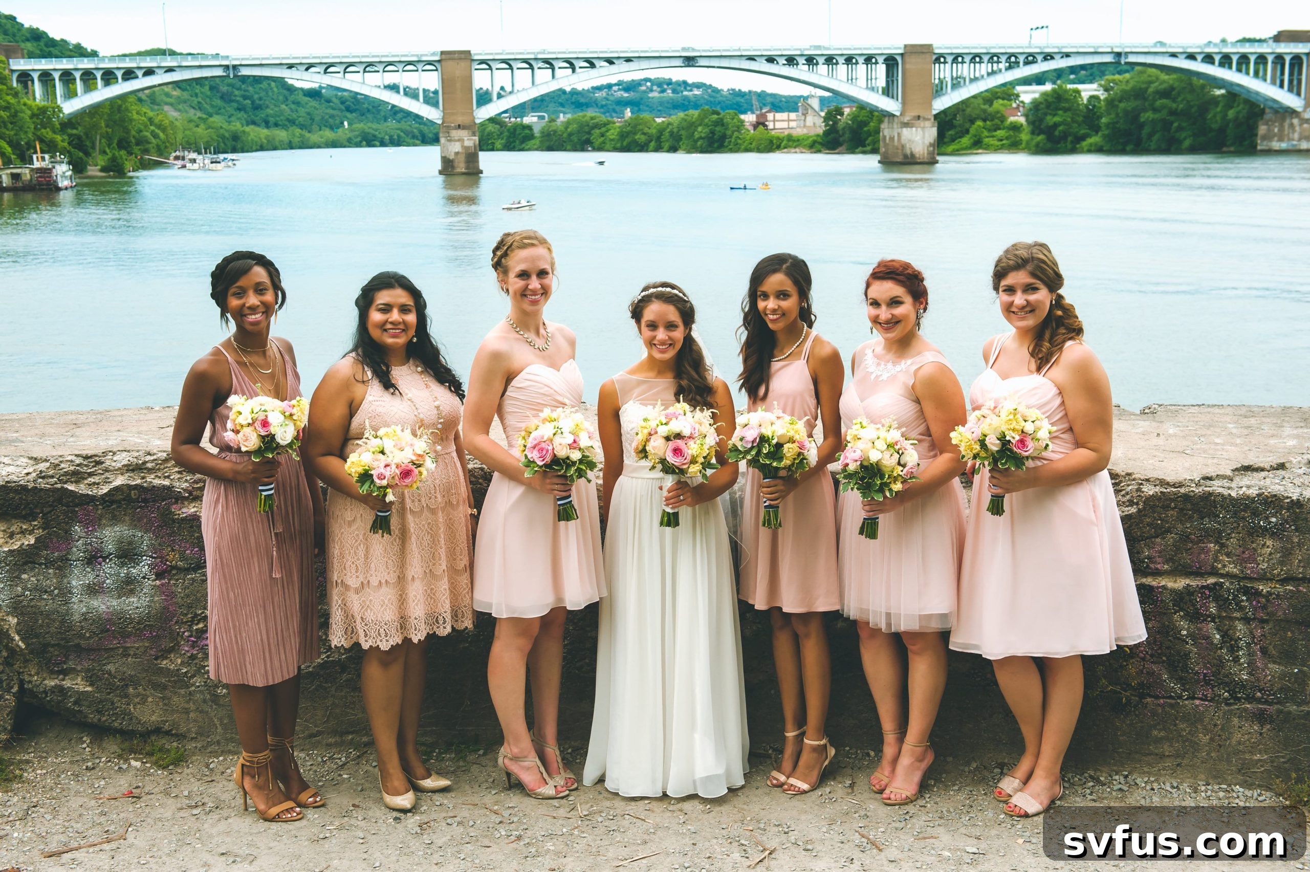 Joyful wedding couple walking hand-in-hand during their photoshoot