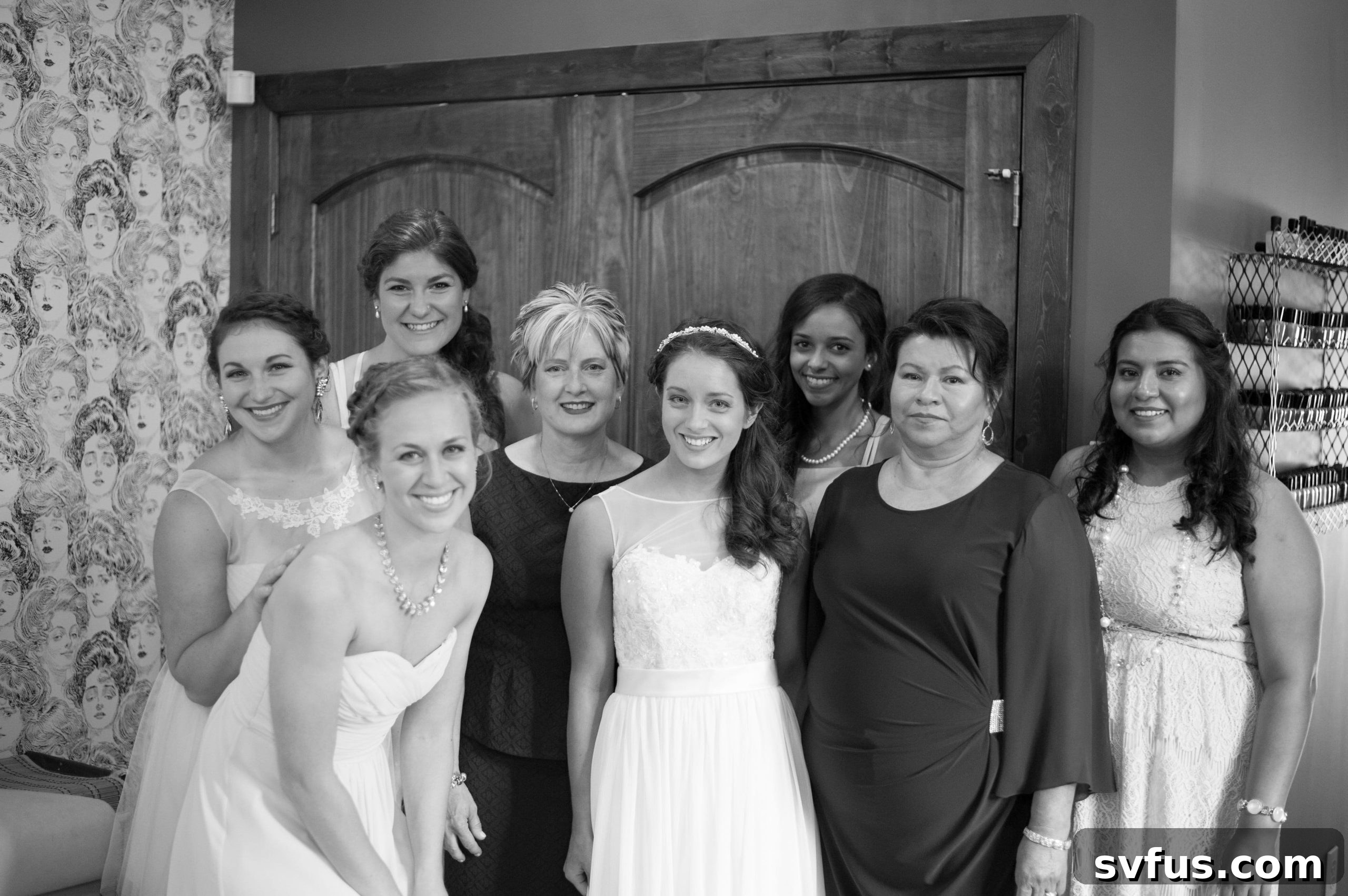Joyful moments of bride and bridesmaids getting ready together