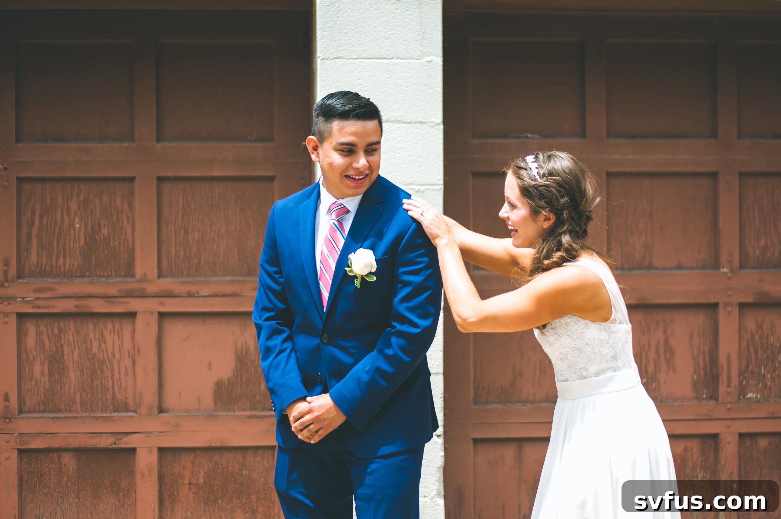 Intimate first look moment between the bride and groom