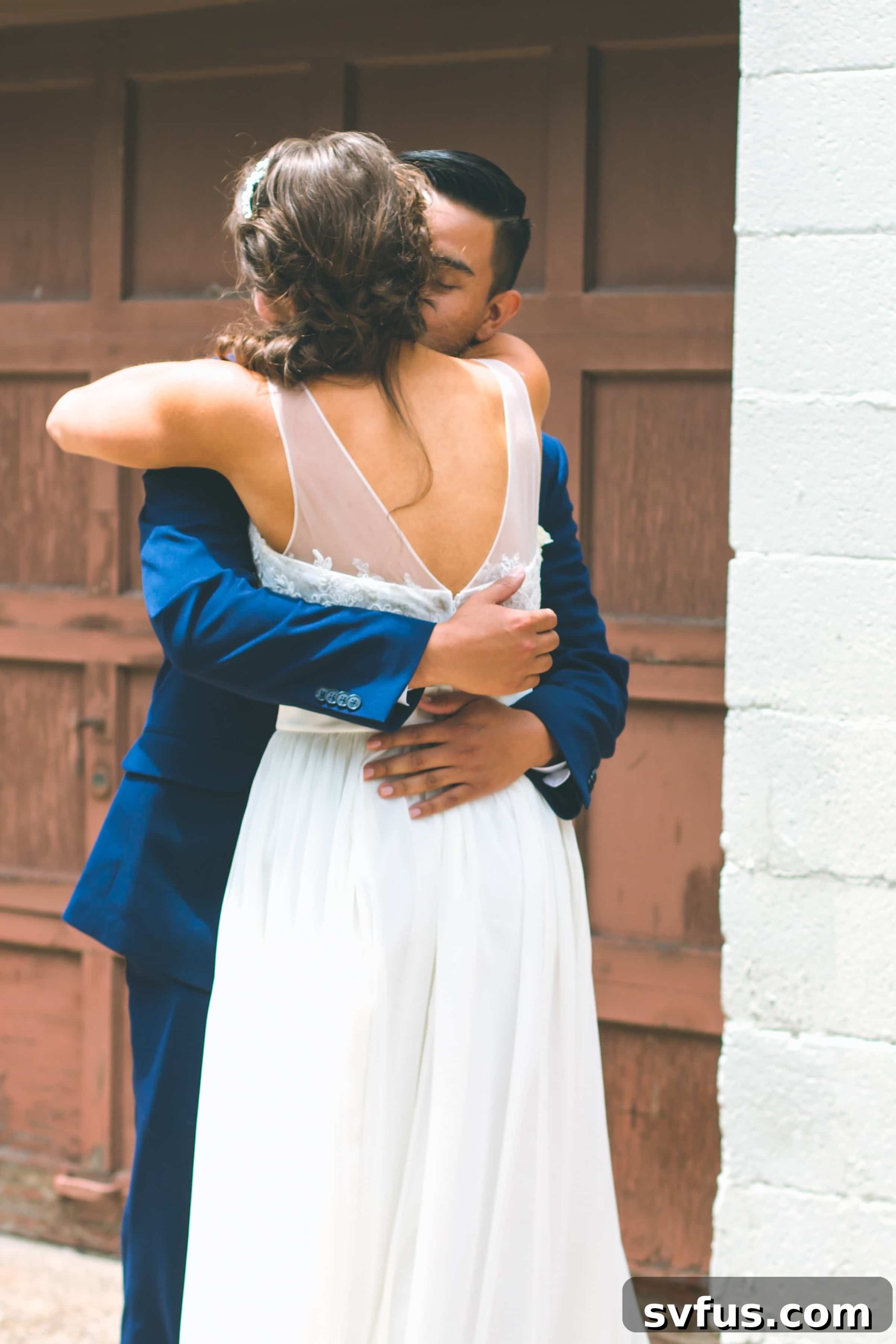 Groom's emotional reaction during the first look with his bride