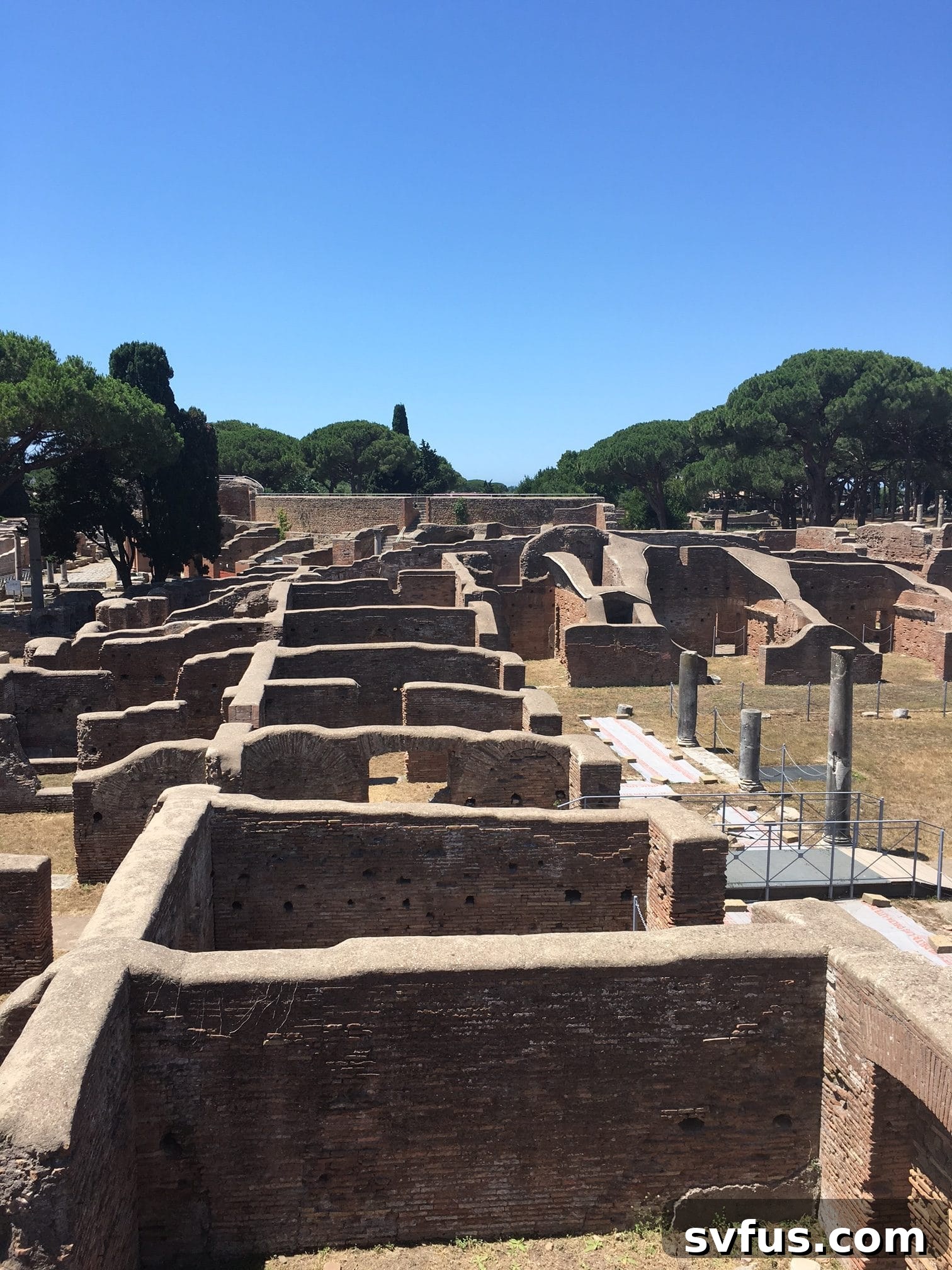 Historical structures and pathways amidst the ruins of Ostia Antica