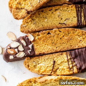Close up photo of biscotti topped with almonds