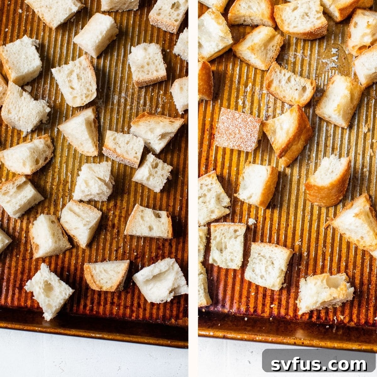 Freshly made homemade croutons evenly spread on a baking sheet, golden and crisp from the oven.