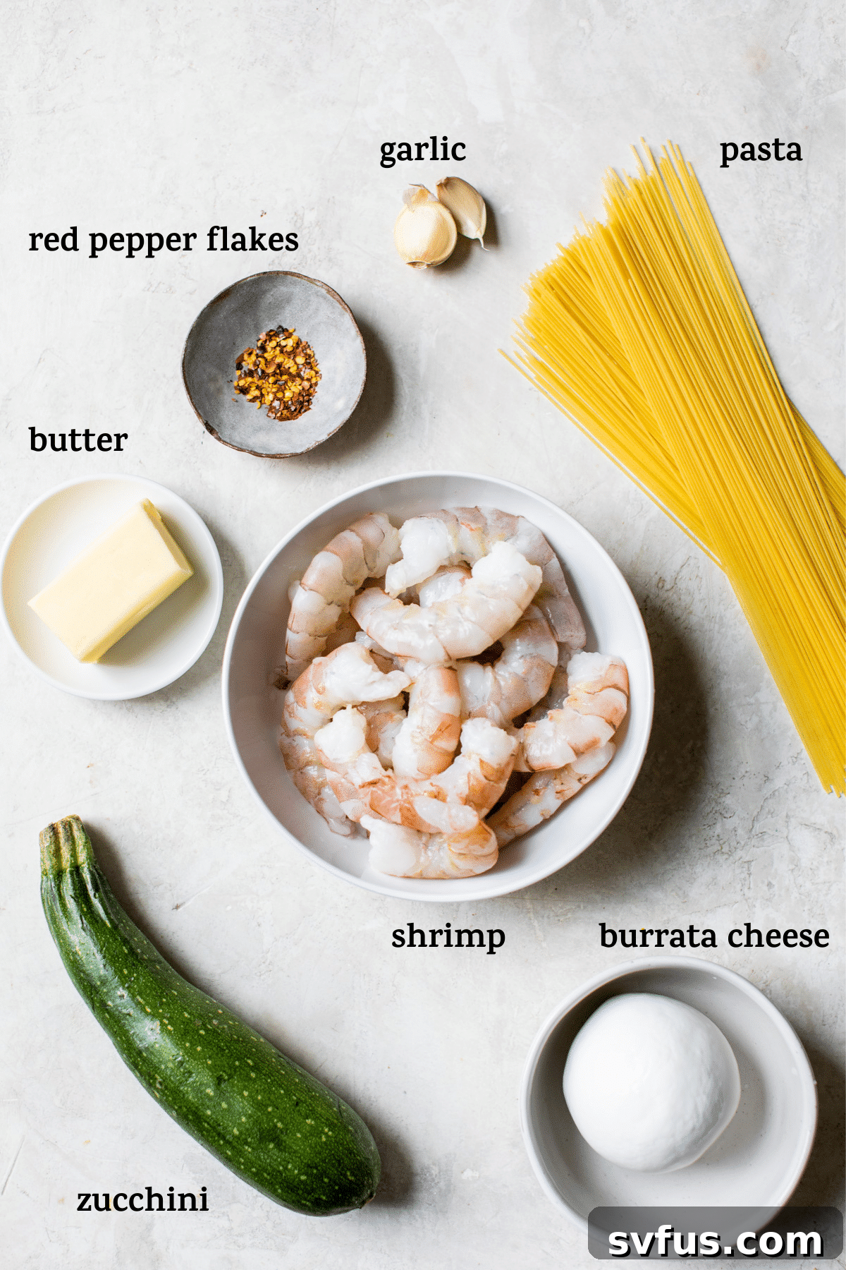 A plate of food on a table, with Pasta and Garlic