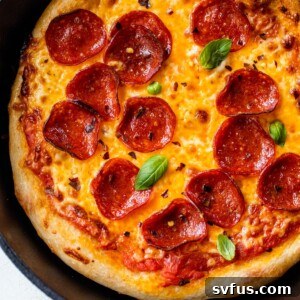 pepperoni pizza in a cast iron skillet