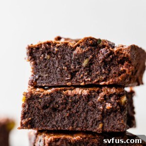 A stack of three fudgy avocado brownies