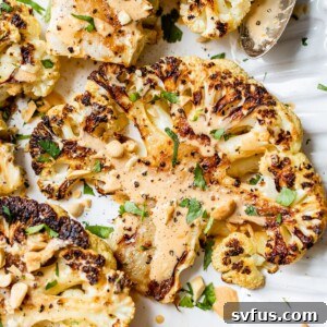 Roasted cauliflower steak on a serving platter