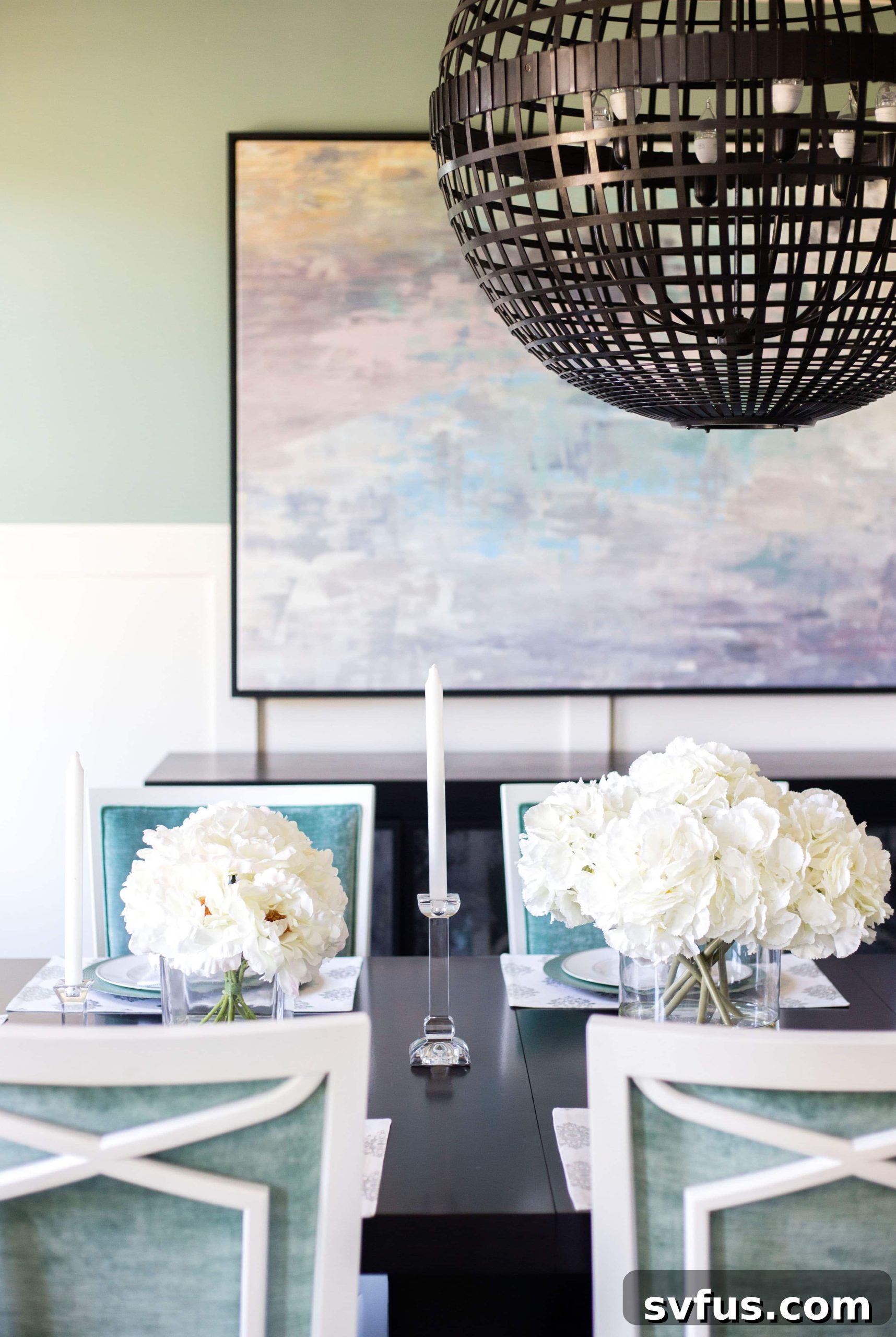 Elegant dining space featuring a minimalist design and wooden accents