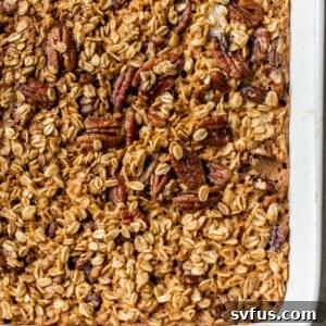 Baked oatmeal with pecans in a casserole dish