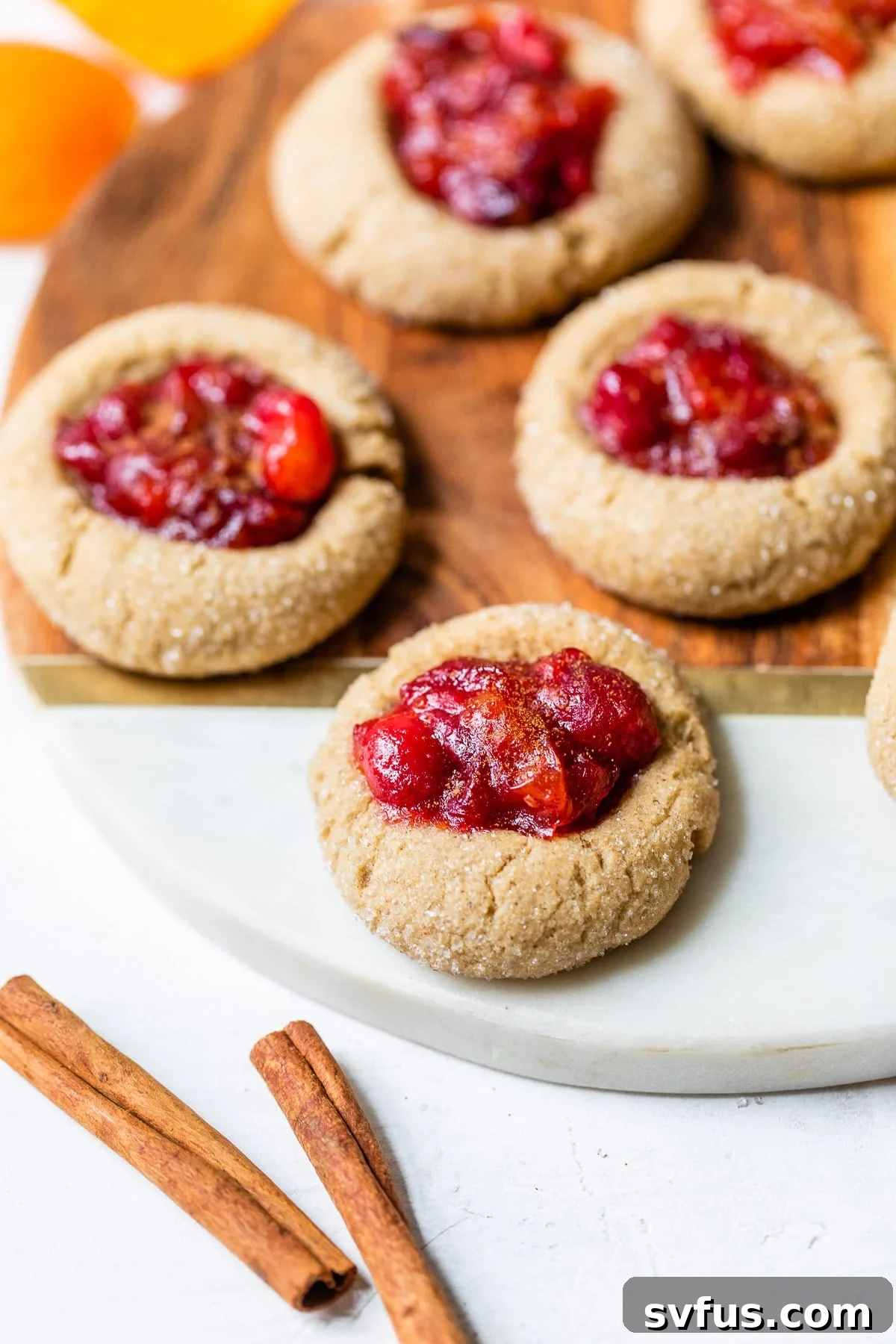 cookies with cranberry jam in the center