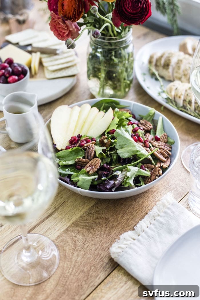 Close-up of a festive holiday tablescape with various dishes and decor.