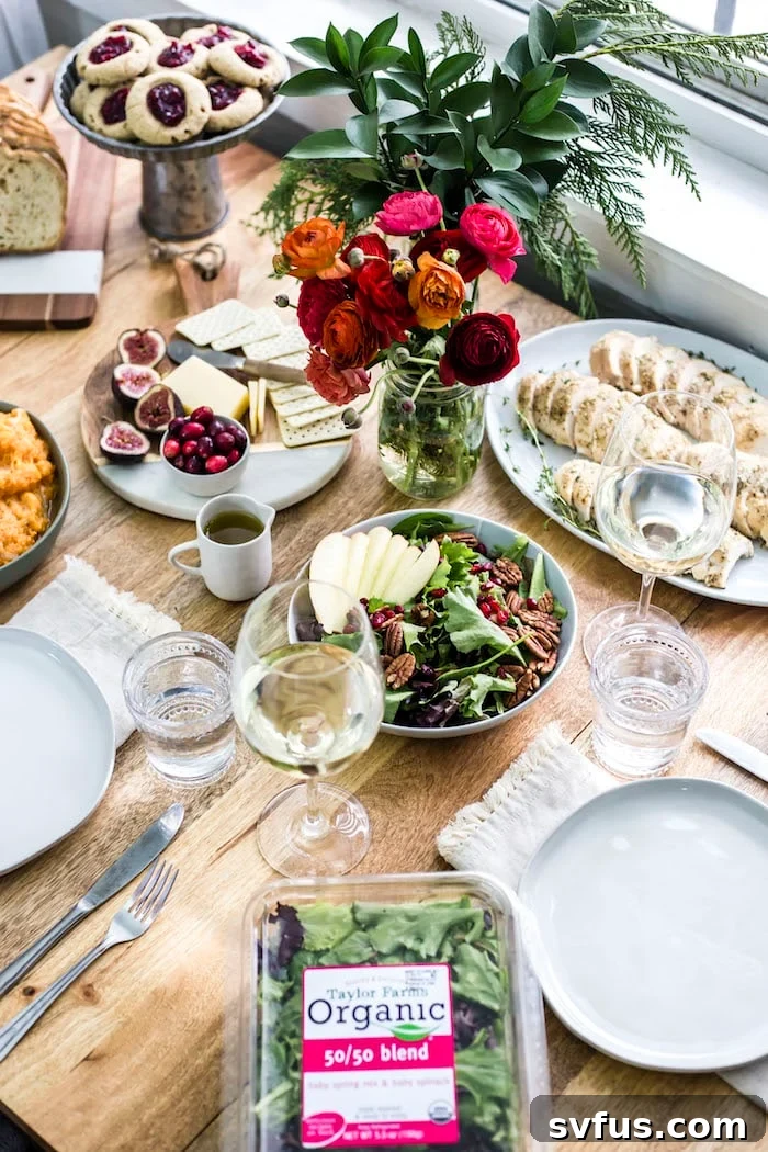 A festive holiday tablescape showcasing a full spread of healthy and delicious dishes.