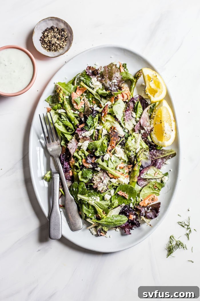 Overhead shot of Garlic Salmon Salad with Tzatziki Sauce, ready to be served.