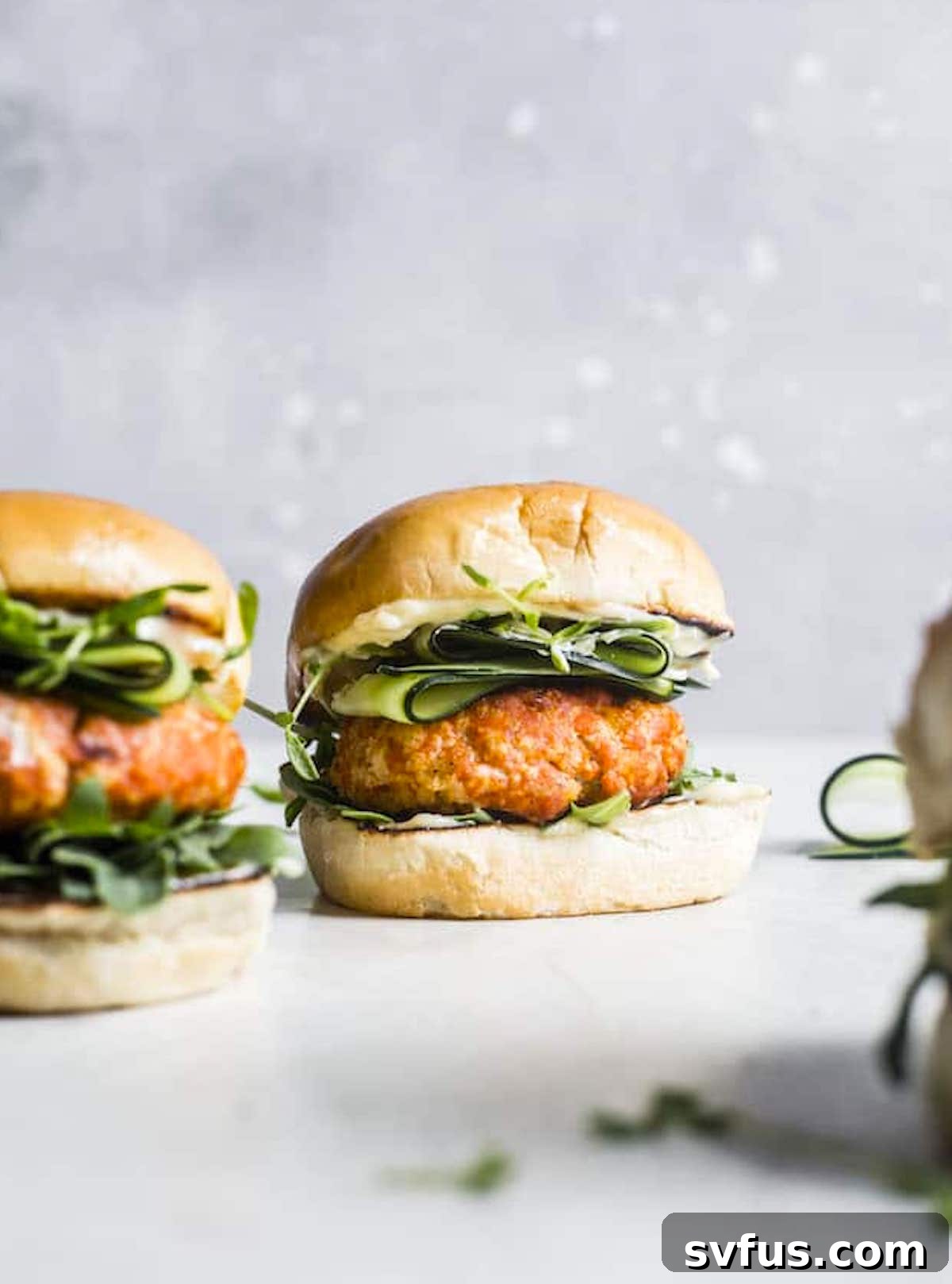 salmon burgers on a table