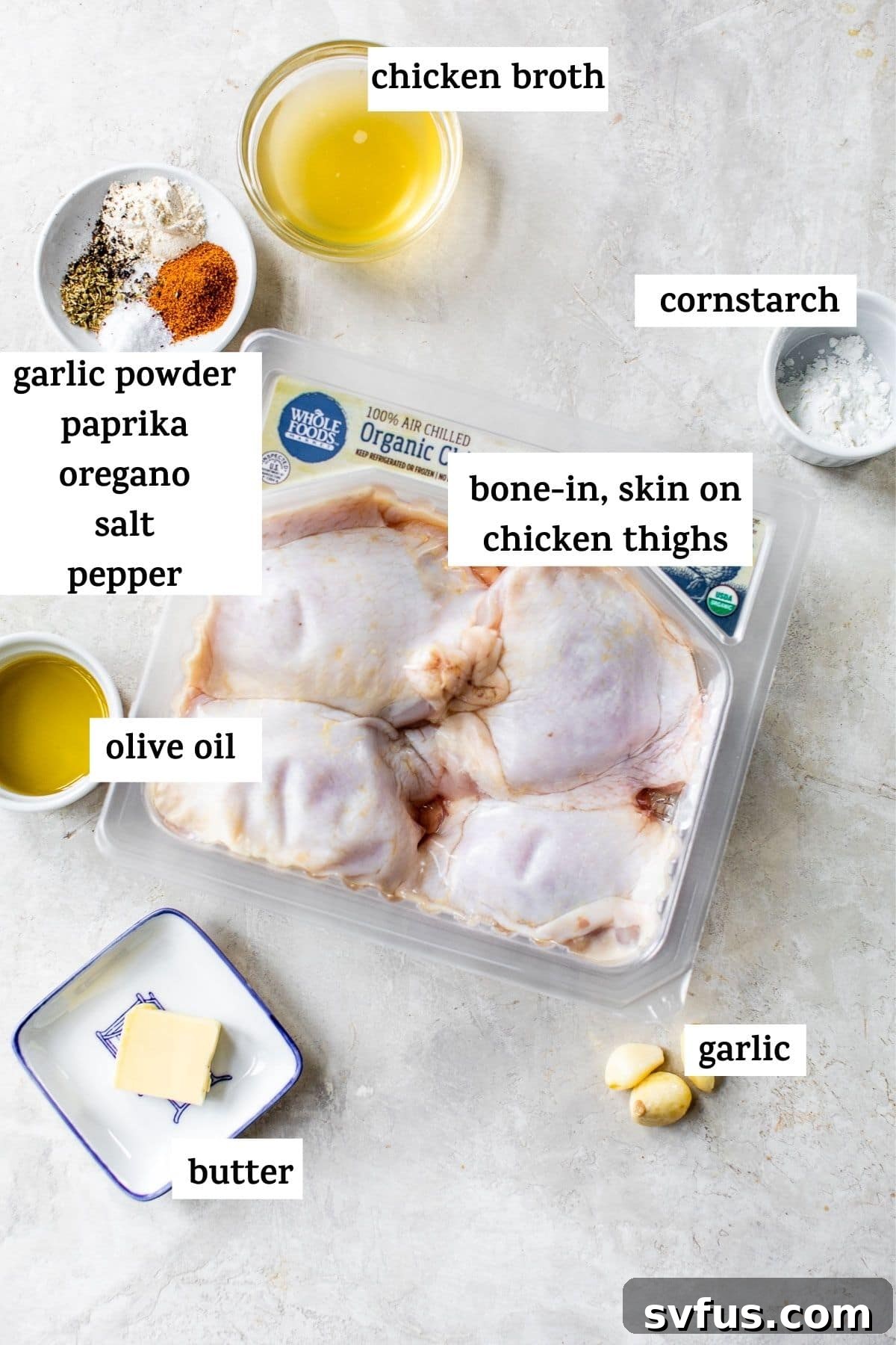 Collection of fresh ingredients for Instant Pot chicken thighs on a rustic table