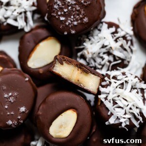 bananas covered in chocolate and shredded coconut