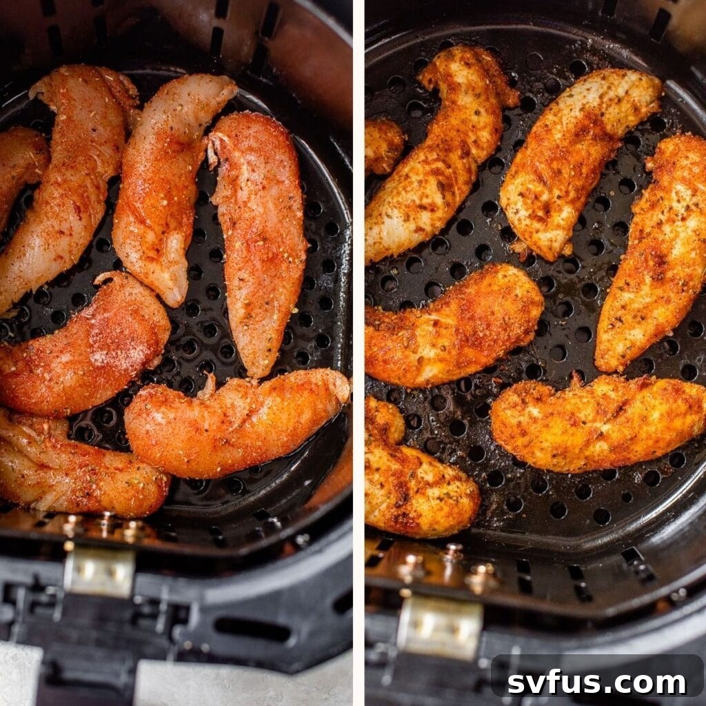 Raw chicken tenders arranged in an air fryer basket, ready for cooking