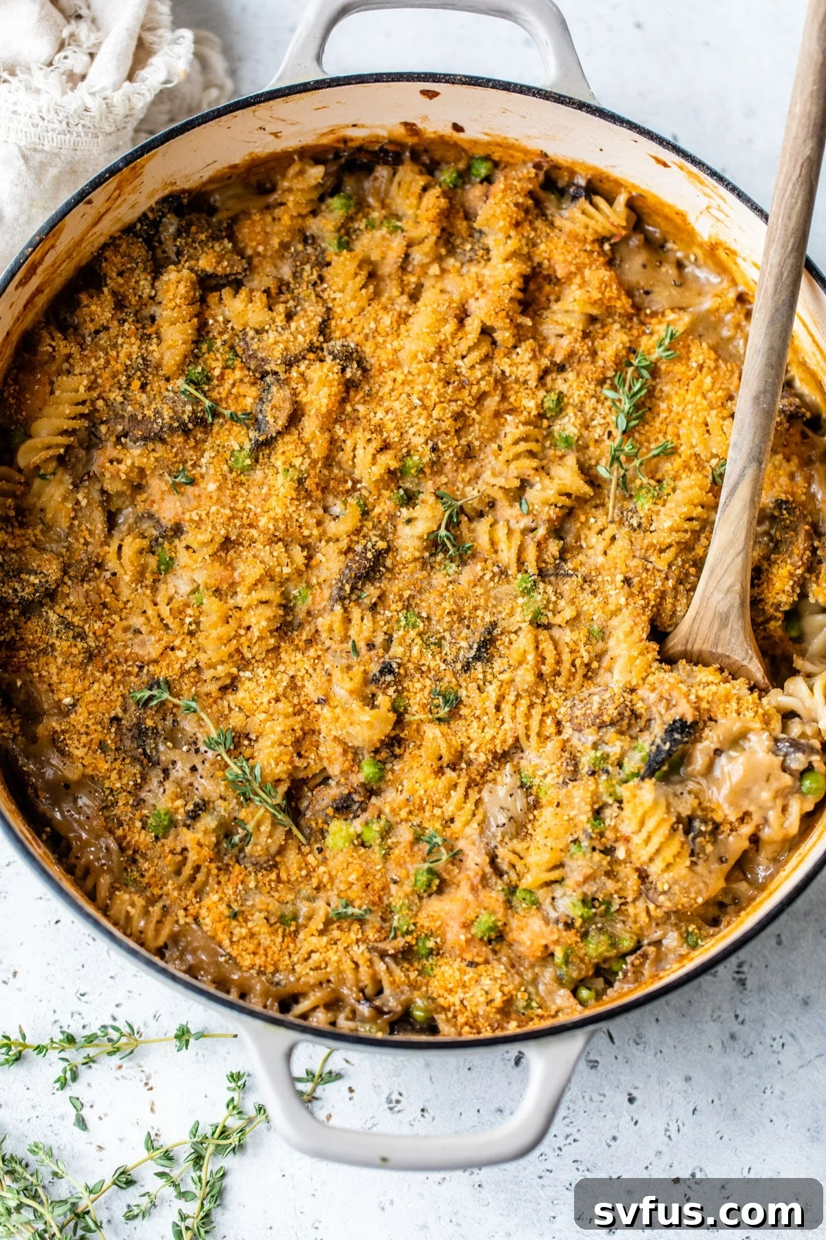 Delicious healthy tuna noodle casserole in a round deep skillet, ready to be served