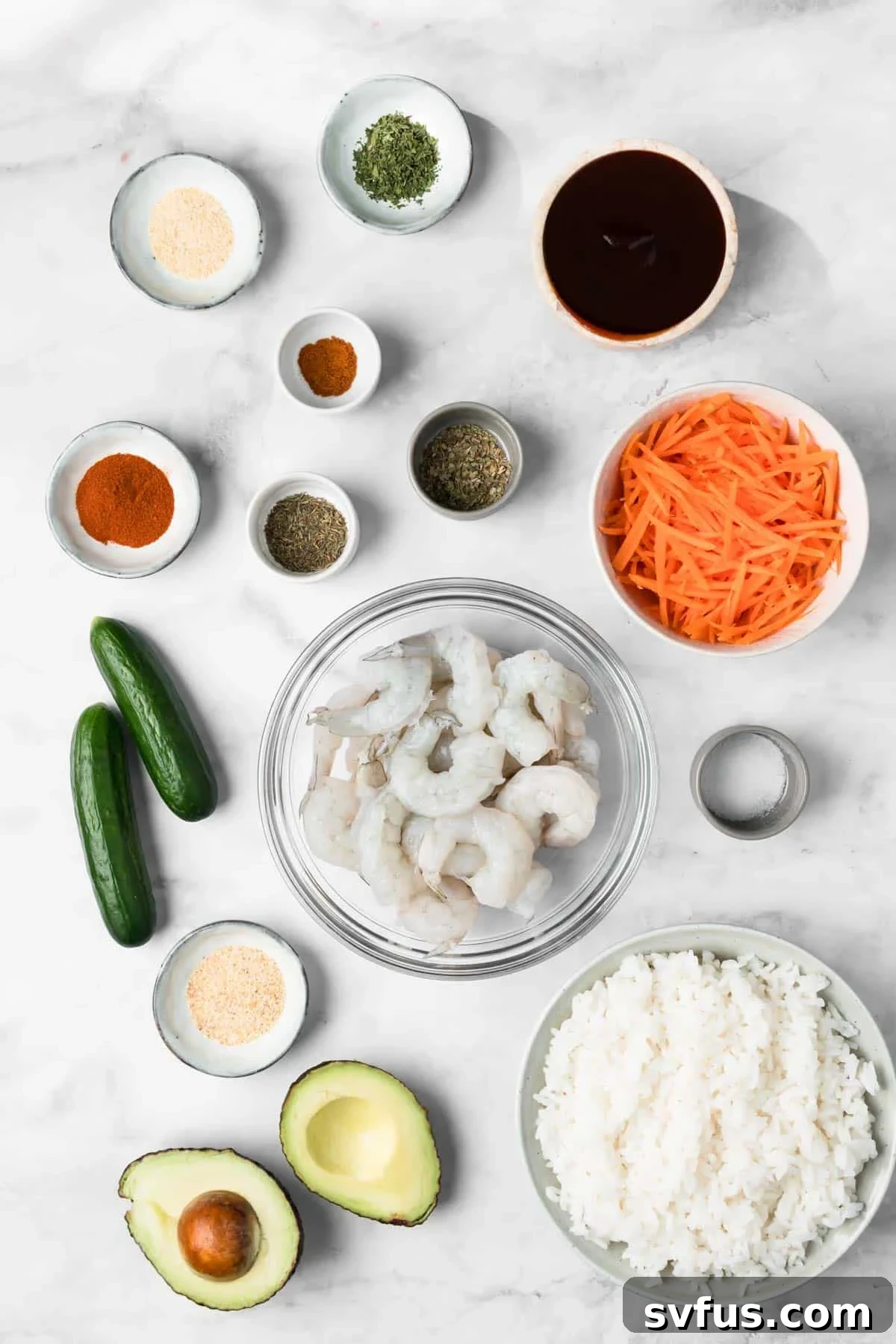 Overhead view of all the fresh, colorful ingredients for BBQ shrimp bowls meticulously arranged in individual small bowls, ready for assembly.