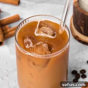 overhead view of an iced horchata latte in a glass.