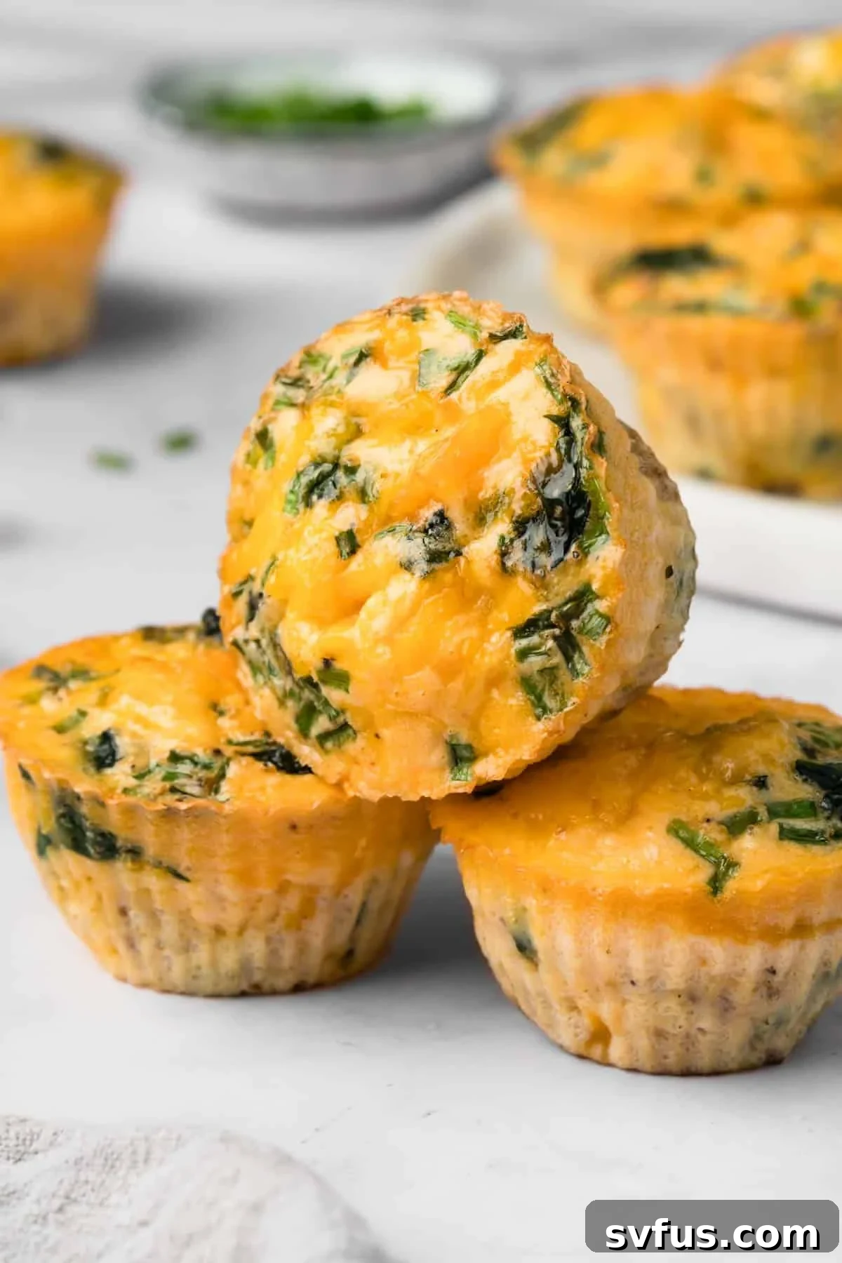 a stack of 3 high protein egg muffins.