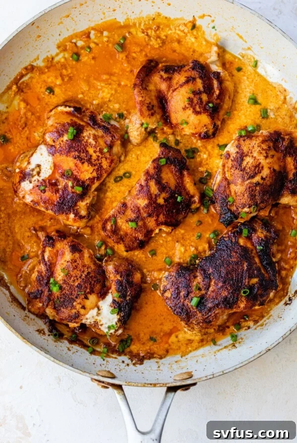 overview of paprika chicken in a large skillet