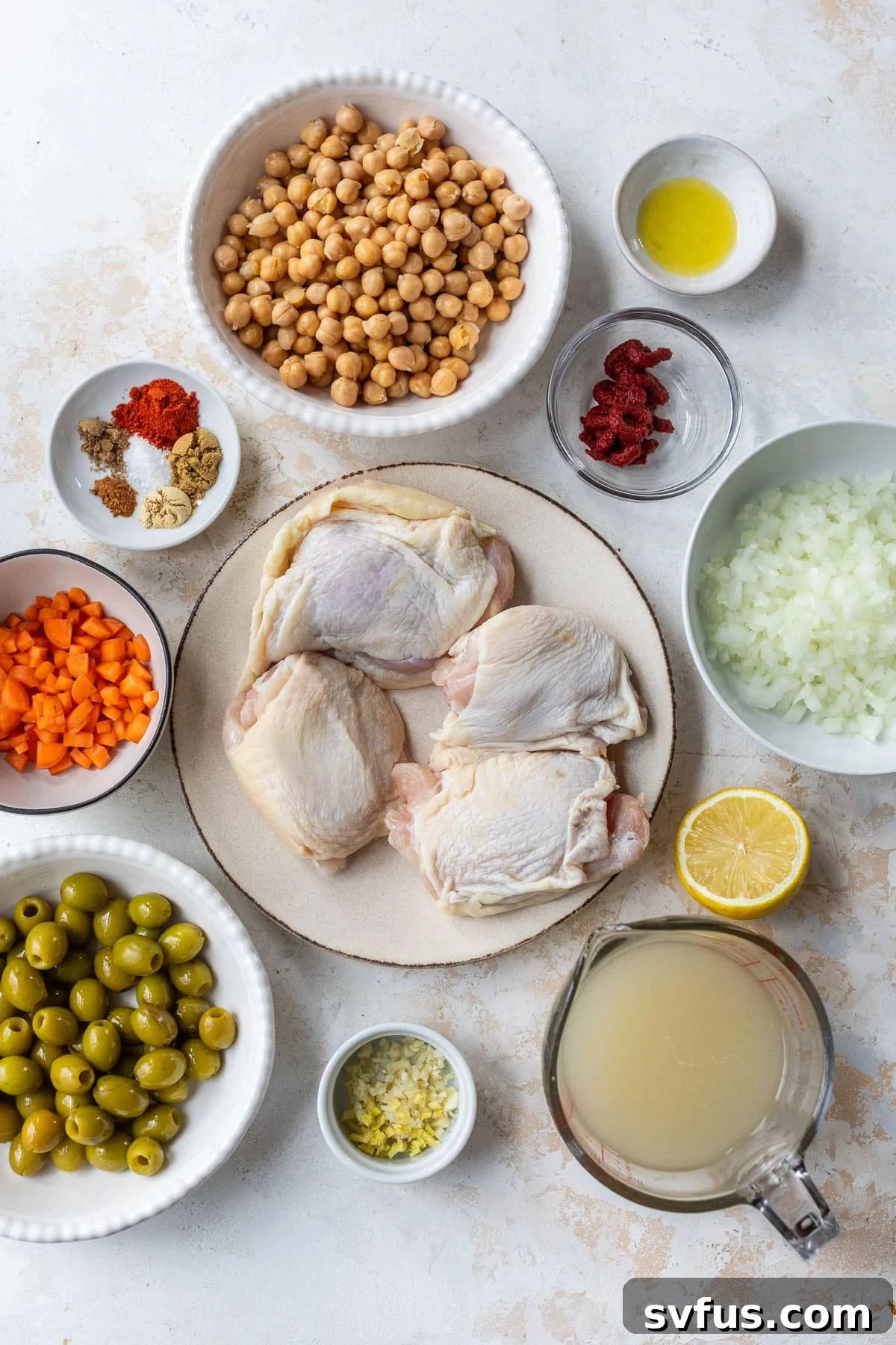 overhead view of the ingredients for Moroccan chicken in individual bowls.